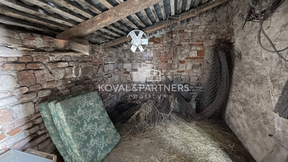 Znížená cena - Rodinný dom s pozemkom v Beladiciach