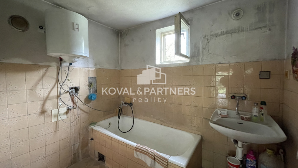 Znížená cena - Rodinný dom s pozemkom v Beladiciach