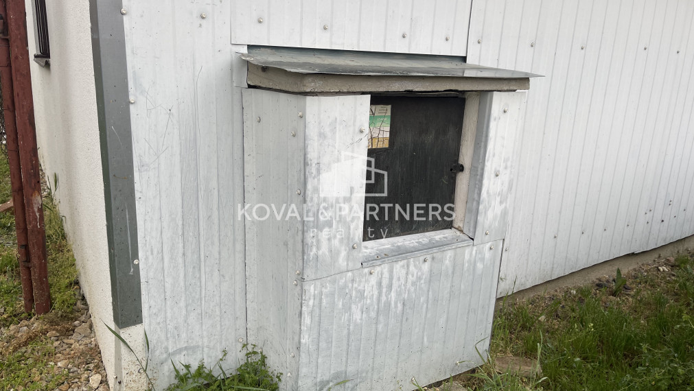 Chatka so záhradou a vinicou - Vráble v časti Horný Dúšnik