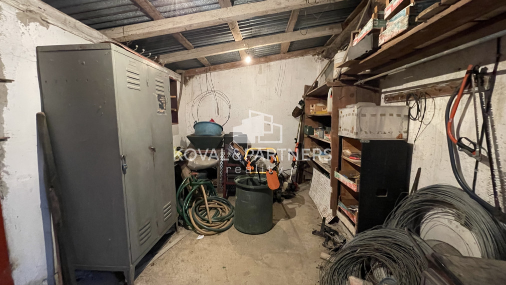 Chatka so záhradou a vinicou - Vráble v časti Horný Dúšnik