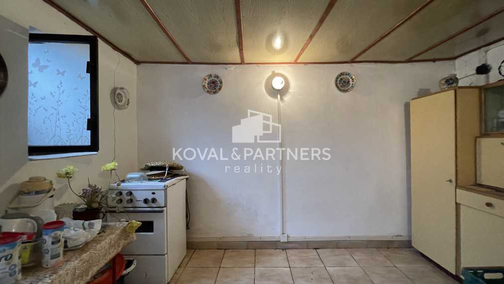 Chatka so záhradou a vinicou - Vráble v časti Horný Dúšnik