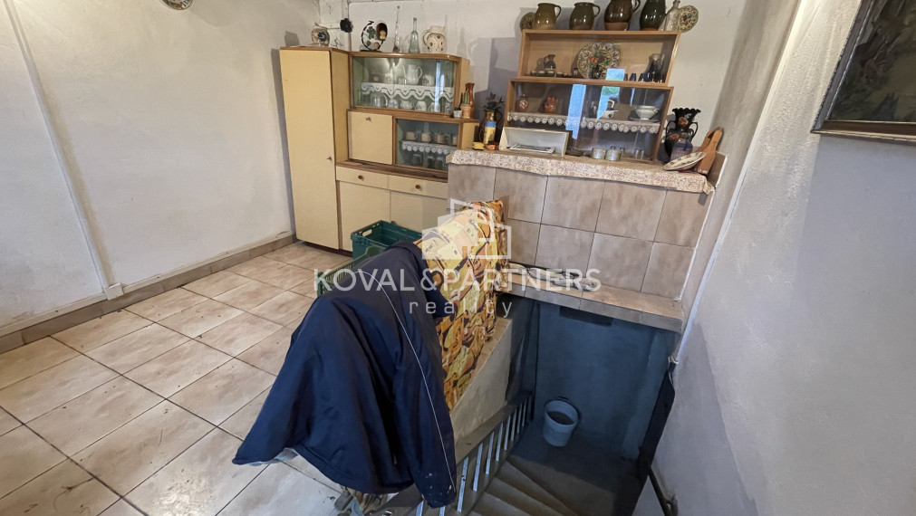 Chatka so záhradou a vinicou - Vráble v časti Horný Dúšnik